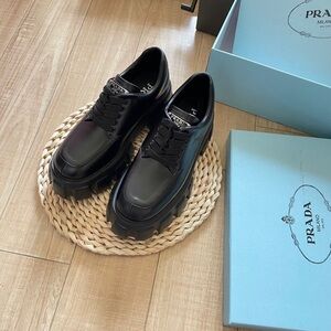Prada Women's Black Glossy Loafers